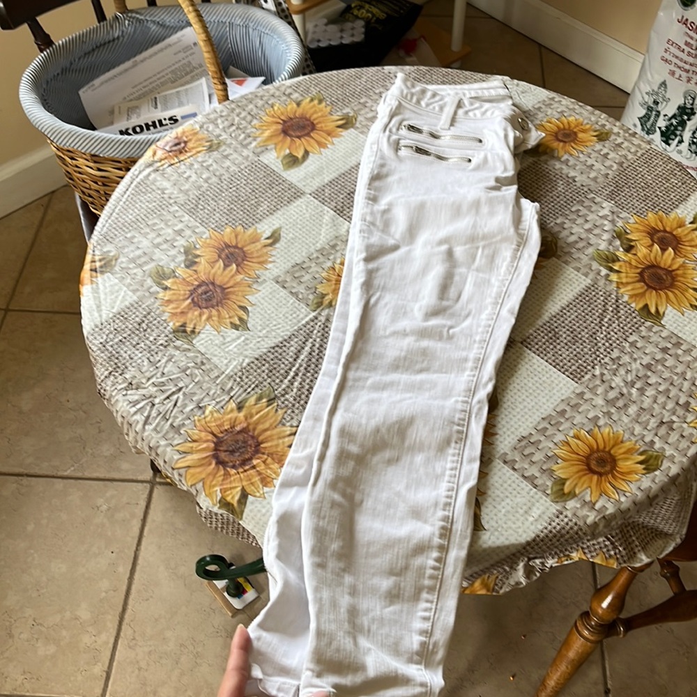 Gently used with no stains or rips zips at ankles
